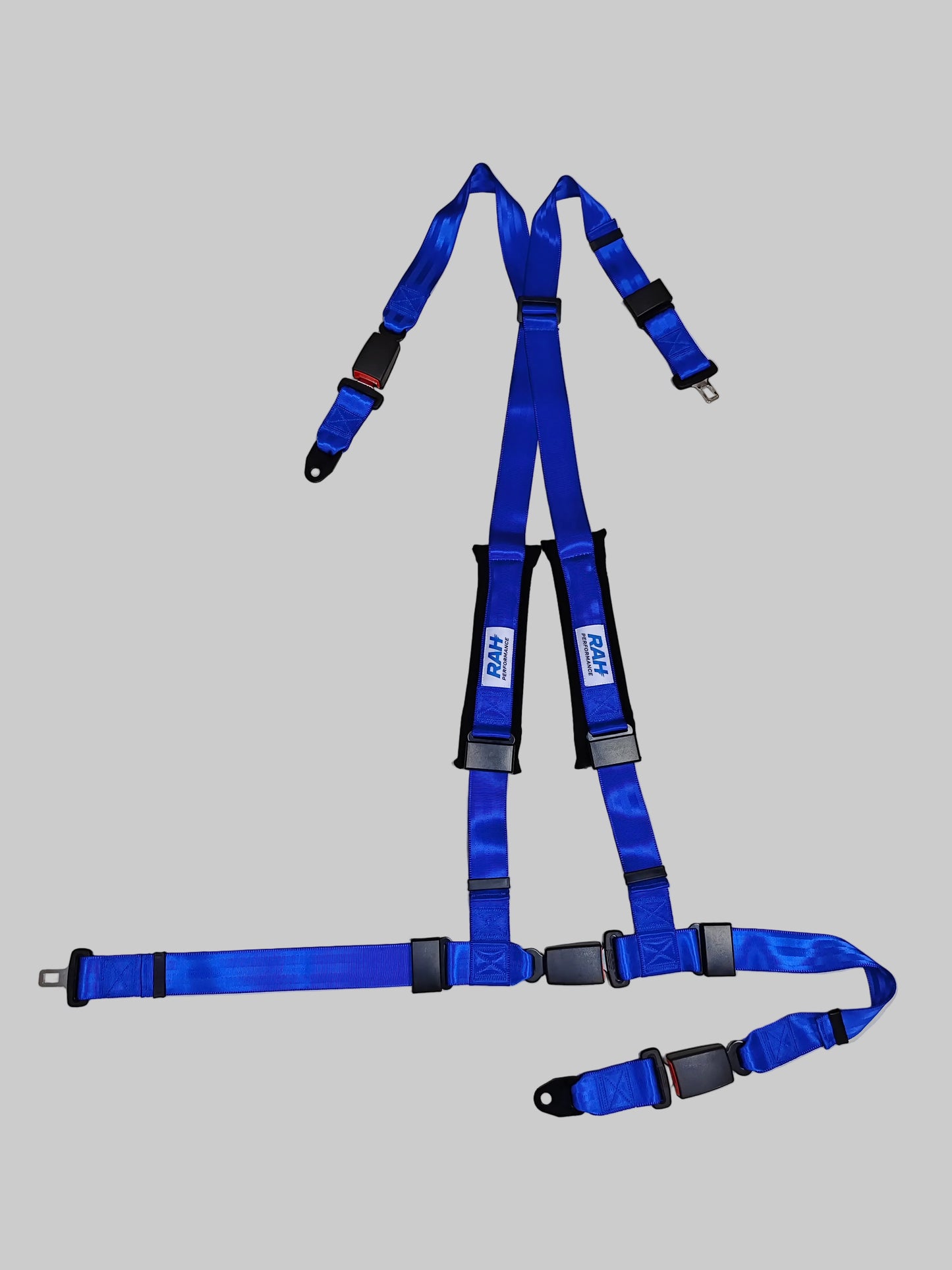 Blue safety harness with black straps on a white background
